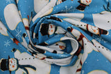 Swirled swatch winter printed fabric in Snowmen on Blue
