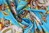 Swirled swatch Bouquet in Bird in Flowers on Blue print fabric