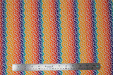 Flat swatch rainbow patches fabric (white fabric with thick rainbow stripes comprised of small organic shaped dots/patches)