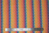 Flat swatch rainbow patches fabric (white fabric with thick rainbow stripes comprised of small organic shaped dots/patches)