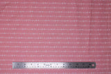 Flat swatch flowers fabric (light pink fabric with small white lines of floral head stripes outlined)