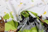 Swirled swatch World of Susybee printed fabric in Farm Animal Scene