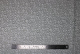 Flat swatch Grey fabric (light grey fabric with small dark grey connected swirls allover)