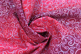 Swirled swatch Red/Silver fabric (multi red toned fabric in subtle large ombre stripes with busy tossed silver/white swirls and holly leaves and berry outlines allover)