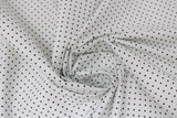 Swirled swatch black fabric (white fabric with small black polka dots allover)