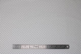 Flat swatch black fabric (white fabric with small black polka dots allover)