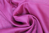 Swirled swatch burgundy sheer fabric