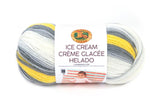 Ball of Lion Brand Ice Cream in colourway Mochi (white, light grey, medium grey, yellow)