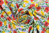 Swirled swatch Wildflowers fabric (white fabric with busy tossed wildflowers and greenery allover in red, yellow, orange and blue/purple)