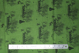 Flat swatch yuletide themed printed fabric in Dashing Through The Snow (green outdoor scene)