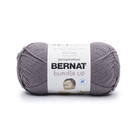A ball of Bernat Bundle Up yarn in shade Nighttime (medium/dark grey)