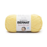 A ball of Bernat Bundle Up yarn in shade Duckling (bright yellow)