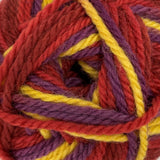 Sunset swatch of Patons Classic Wool Worsted yarn (reds, purple, yellow colourway)