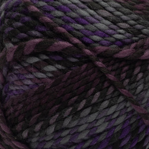 Ball of Red Heart Gemstone yarn in shade amertrine (dark faded purples, greys and black colourway with twists)