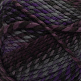 Swatch of Red Heart Gemstone yarn in shade amertrine (dark faded purples, greys and black colourway with twists)