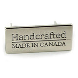 Metal Bag Label: "Handcrafted - Made in Canada"