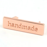 Metal Bag Label: "handmade"