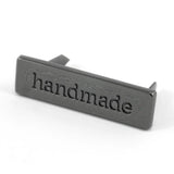 Metal Bag Label: "handmade"