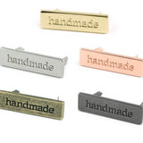 Metal Bag Label: "handmade"