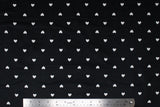 White Hearts on Black - 43/44" - 100% cotton flannel