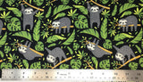 Flat swatch chillin' sloths printed fabric in black (black fabric with tossed greenery and pot leaves, cartoon grey happy sloths with joints in mouth on branches)