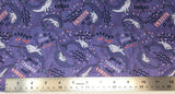 Flat swatch unique narwhal printed fabric in purple (purple fabric with tossed purple cartoon narwhals and "Unicorn of the sea" "You are strange and wonderful" text, tossed white sea plants behind and pink/white stars)