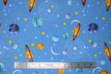 Flat swatch comfy print flannel in planets (planets and stars on light blue)