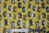 Flat swatch comfy print flannel in cats (happy cartoon cat heads/faces on yellow)