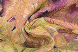 Swirled swatch autumn leaves printed upholstery fabric (yellow/orange/red autumn leaves collage)