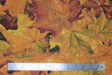 Flat swatch autumn leaves printed upholstery fabric (yellow/orange/red autumn leaves collage)