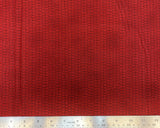 Red marbled fabric with subtle black pebbled texture look