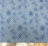 Light/medium blue marbled fabric with black star dots