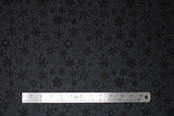 Flat swatch black fabric (black fabric with tossed black snowflakes allover)