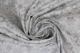 Swirled swatch silver fabric (white fabric with tossed silver sparkle effect snowflakes allover)