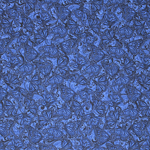 Square swatch accent on flowers printed fabric (medium blue fabric with busy floral and butterflies collage print in similar blues)