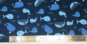 Group swatch cartoon whales fabric in blue and white