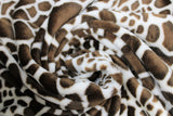 Swirled swatch animal print fleece in giraffe print (dark brown on white)