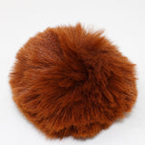 Faux Rabbit (Short Hair) Pom Pom in red (front)