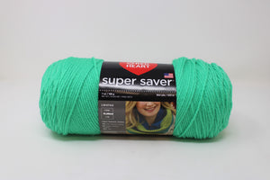 Square swatch small ball of yarn (RH super saver) in green colourway