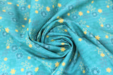 Swirled swatch daisy printed fabric in aqua (yellow daisies on medium turquoise/aqua)