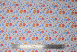 Flat swatch doctor themed printed fabric in medical equipment (cartoon medical equipment in orange/pink/blue on white)