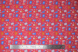 Flat swatch doctor themed printed fabric in hospital heartbeat (white/orange/blue medical equipment and orange hearts with beats on pink)