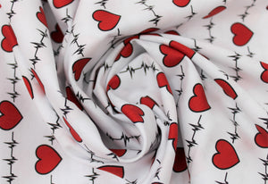 Group swatch hearts and heartbeat lines printed fabrics on white and black