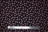 Flat swatch Tossed Flamingos fabric (black fabric with tossed small pink flamingos allover)