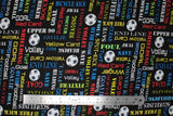 Flat swatch Phrases fabric (black fabric with tossed soccer balls and packed words allover in various styles and directions and colours all related to soccer "Goal" "end line" etc)