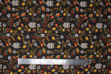 Flat swatch Autumn Owls fabric (dark brown fabric with tossed colourful fall branches and floral bulbs in white allover with tossed grey and colourful owls)