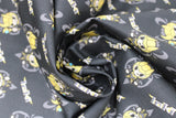 Swirled swatch Loki marvel kawaii printed fabric (Small Loki and symbols yellow on black)