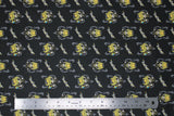 Flat swatch Loki marvel kawaii printed fabric (Small Loki and symbols yellow on black)