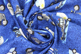 Swirled swatch Tossed Vehicles fabric (textured look blue fabric with tossed illustrative style police vehicles: cars, motorcycles, boats, helicopters, etc.)