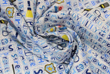 Swirled swatch Words fabric (white fabric with police related text allover in blue with square outlines: "Protect" "Teamwork" etc. with scattered cartoon style police related emblems: cuffs, vest, flashlight, etc.)
